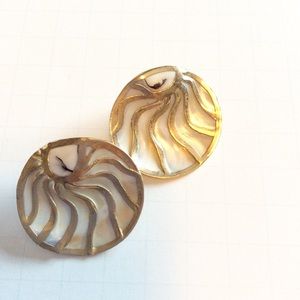 Shell with gold earrings